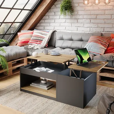 A modern living room with a couch, coffee table, and large window.