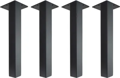 Four black table legs are arranged in a row against a white background.
