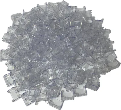 A pile of transparent LEGO windshield pieces.
