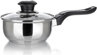 A stainless steel saucepan with a glass lid and a black handle, isolated on a white background.