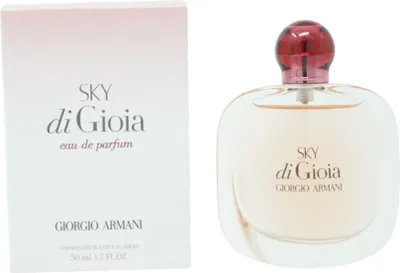 A product shot of a perfume bottle and its box, both featuring the same branding and product name.