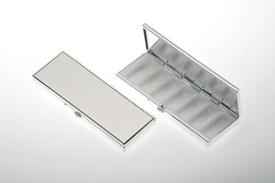 Produktbild von Pillendose 7-geteilt rechteckig glatt verchromt 10,0 x 3,5cm