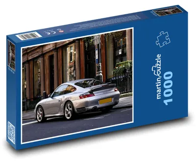 Obrázek produktu pro Puzzle 1000 Stříbrný sportovní vůz ve městě - martinpuzzle