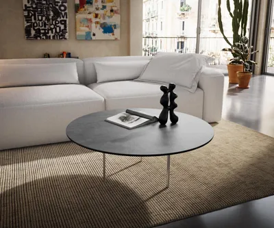 Produktbild von DELIFE Couchtisch Edge Rund 90x90 cm Keramik Beton Grau Trive Metall Schwarz