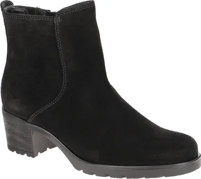 A black suede ankle boot with a block heel is shown against a white background.