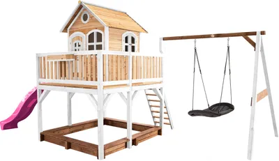 Produktbild von AXI Spielhaus Liam mit Sandkasten, Nestschaukel & lila Rutsche | Stelzenhaus XXL in Braun & Weiß aus  Holz für Kinder | Spielturm mit Wellenrutsche & Schaukel für den Garten