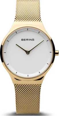 A close-up studio shot of a gold Bering watch with a white face.