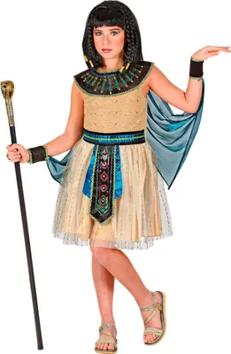 A young girl dressed in a Cleopatra costume, holding a staff.