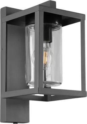 A modern outdoor wall light with a dark gray metal frame and a clear glass cylinder housing a light bulb.