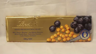 Produktbild von Lindt Schokolade Vollmilch, Traube & Nuss, 300g Tafel (Swiss Premium Chocolate Lait-Raisin-Noisettes)