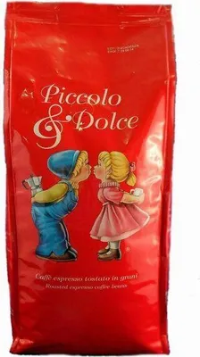 A red bag of Lucaffe Piccolo & Dolce coffee beans, featuring an illustration of two children about to kiss.