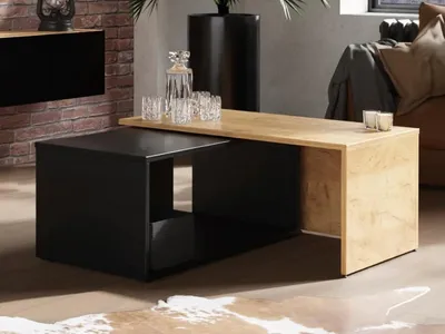 A modern living room setting with a coffee table set.