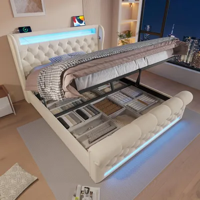A beige upholstered bed with its storage compartment open, revealing neatly organized items inside. The bed features LED lighting along its base and headboard.