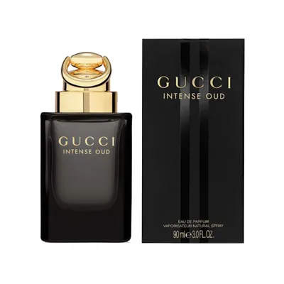 A product shot of Gucci Intense Oud Eau De Parfum Spray and its packaging.