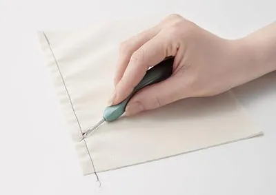 Produktbild von Nahttrenner in Blau mit griffigem Design