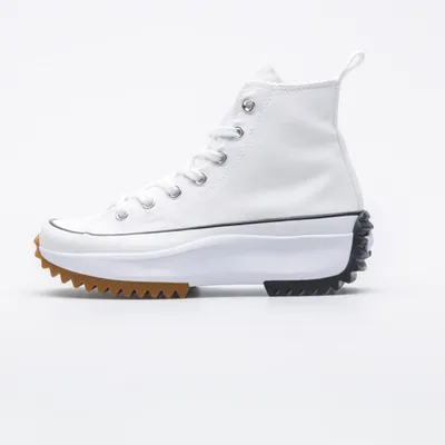 A side view of a white Converse Run Star Hike high-top sneaker with a platform sole.