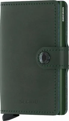 A close-up, side view of a green Secrid Miniwallet.