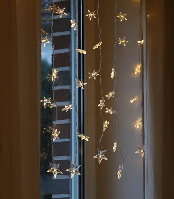 LED Lichtervorhang STERNE - 64 warmweiße LED - L: 1,2m - H: 1m - Trafo - für Innen - transparent