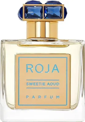 A close-up studio shot of a perfume bottle.