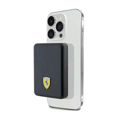 A black Ferrari power bank is attached to the back of a white iPhone.