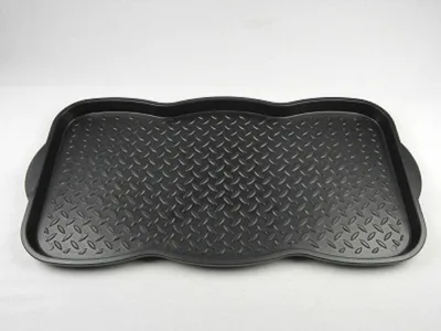 A black shoe tray with a diamond pattern on a white background.