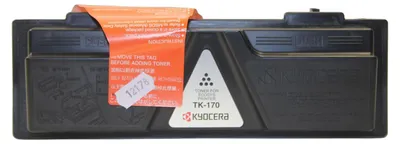A black toner cartridge for a Kyocera printer, with an orange warning label attached.