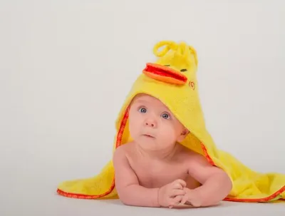 Produktbild von Baby Kapuzenbadetuch - Puddles die Ente