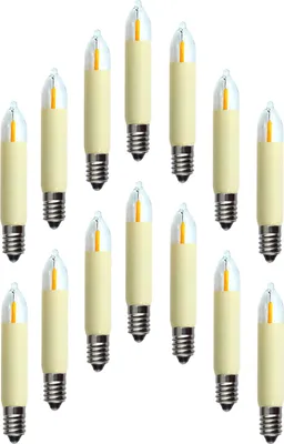 A collection of LED filament candle bulbs arranged in rows on a white background.