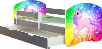 A children's bed with a unicorn theme, featuring a pull-out drawer.