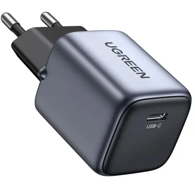 A close-up studio shot of a UGREEN USB-C charger.