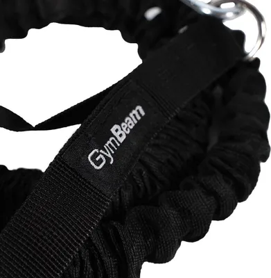 A close-up shot of a black resistance band with a GymBeam logo on a fabric tag.
