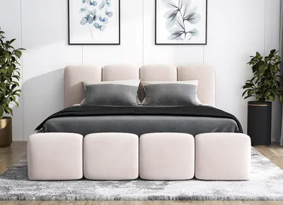 A bedroom scene with a bed and decorative elements.