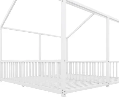 A white house-shaped bed frame with a slatted base and a railing.