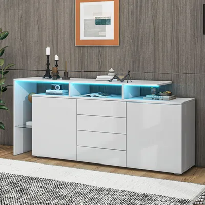 A white sideboard with LED lighting is displayed in a room with a wooden wall and a patterned rug.