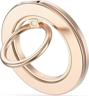 A rose gold magnetic ring holder for a phone.
