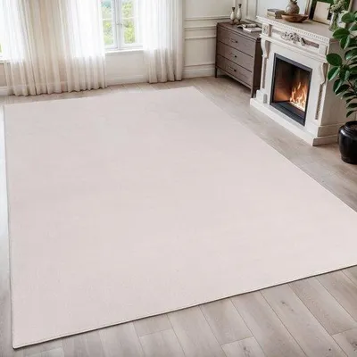 Imagen del producto de Alfombra de pelo corto lavable Unyqoos® de 160x230 cm (rectangular) – Color crema liso, poliéster de 1250 g/m², lavable a 30°C, certificado 100