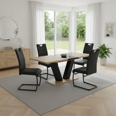 A dining room set with a table and chairs, set in a well-lit room with large windows overlooking a garden.