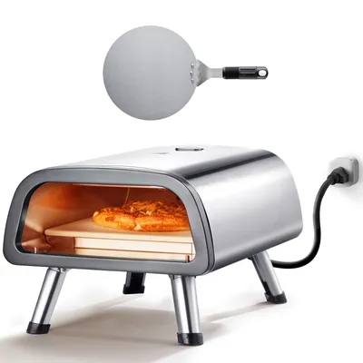 A stainless steel pizza oven with a pizza inside, shown with a pizza peel above it.