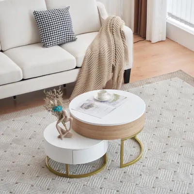 A living room setting with a sofa and coffee tables.