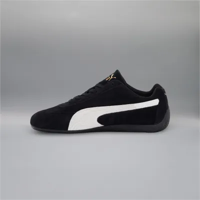 A single black Puma Speedcat OG sneaker is shown against a plain gray background.