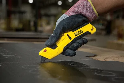Produktbild von Stanley FMHT10365-0 Einweg-Sicherheitsmesser, dreiseitiger Schieber, 4 Klingen