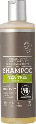 A bottle of URTEKRAM Shampoo for irritated scalp with Tea Tree oil.