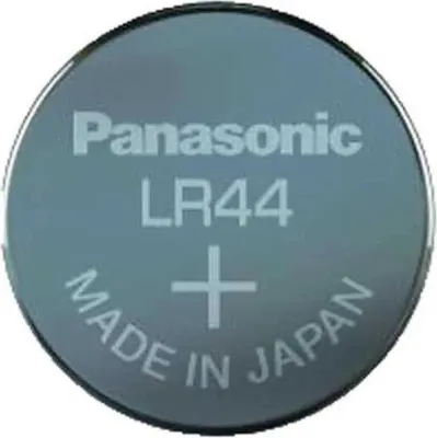 A close-up, top-down view of a single Panasonic LR44 coin cell battery.