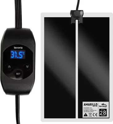 A black heating mat with a digital thermostat and LCD display.