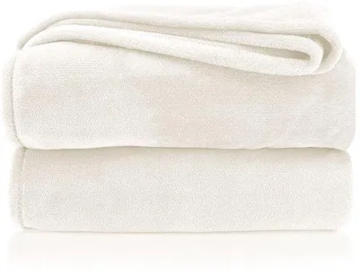 Zdjęcie produktu dla Koc flanelowo-polarowy Unyqoos® o wymiarach 200 x 150 cm – wyjątkowo miękki, bez efektu meszku, certyfikat Oeko-Tex, kolor kremowy, łatwy w pielęgnacji, można prać w pralce