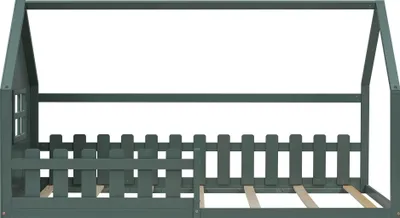 A green wooden children's house bed frame with a picket fence detail and a slatted base.