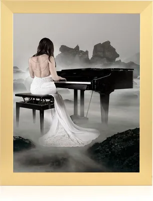 A woman in a white dress plays a grand piano in a misty, rocky landscape.