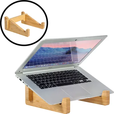 A laptop is placed on a wooden stand.