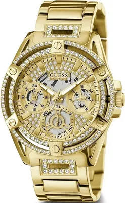 A close-up studio shot of a gold Guess watch.