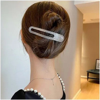Productafbeelding van Witte acryl haarclip met een eendenbekvorm